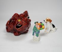 A Burmantofts style grotesque toad spoon warmer, a Royal Doulton dog ornament and The Balloon
