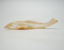 A carved mother of pearl model of a fish, 15.5cm