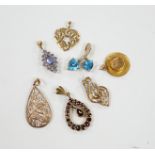 Seven assorted modern mainly 9ct and gem set small pendants, including diamond chip cluster, gross