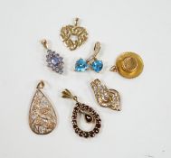 Seven assorted modern mainly 9ct and gem set small pendants, including diamond chip cluster, gross