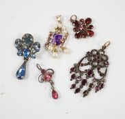 A Georgian yellow metal and foil backed garnet set cluster pendant, 26mm and four other later