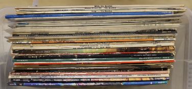 Thirty-six LP record albums, including The Beatles, The Rolling Stones, Pink Floyd, Cream, Jimi