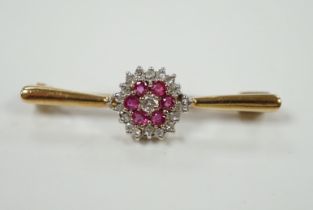 A 9ct, ruby and diamond cluster set bar brooch, 35mm, gross weight 2.7 grams.