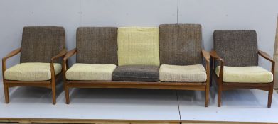 In the manner of Zenon Baczyk, a mid century teak three piece lounge suite, settee length 168cm,
