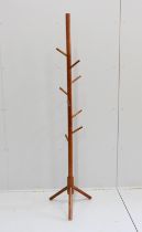 A mid century design teak nine peg clothes tree, height 178cm