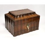 A Ceylonese calamander tea caddy, c.1820, with four internal compartments and key, 29cm wide