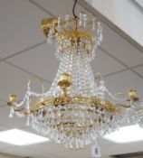 A brass and glass drop three tier chandelier, light approximately 53cm high (not including chain)