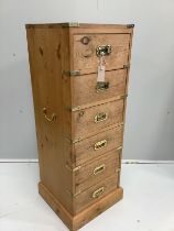 A military style narrow pine six drawer chest, width 38cm, depth 39cm, height 109cm