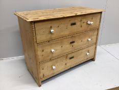 A 19th century East European pine three drawer chest, width 124cm, depth 58cm, height 93cm