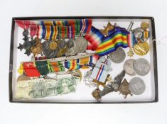 A collection of eighteen medals and some associated miniatures; a WWI/WWII group including a