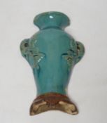 A Chinese Guandong turquoise glazed pottery wall vase, early 20th century, 25cm high