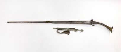 A 19th century Albanian flintlock miquelet lock rifle (Balkan long arm) and a Caucasian style