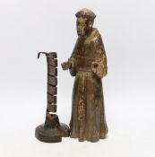 An 18th century Spanish carved and painted wood figure of a monk and 18th century ‘rat de cave’
