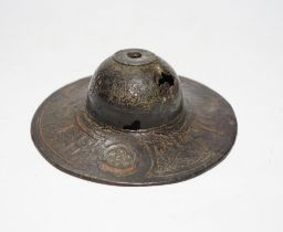 An early Islamic bronze and copper inlaid shield boss, 14.5cm