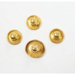 Four 18ct dress studs, 3.3 grams.