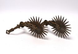 A pair of 19th century South American rowel spurs