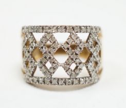 A modern 9ct gold and diamond chip cluster set dress ring, size P, gross weight 4.8 grams.