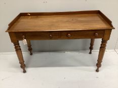 A Victorian mahogany two drawer writing table, width 120cm, depth 50cm, height 76cm