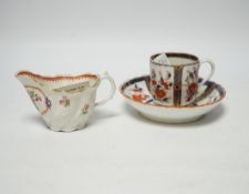 A Worcester ‘low Chelsea ewer’ milk jug, c.1770 and a Worcester Japan pattern coffee cup and saucer,