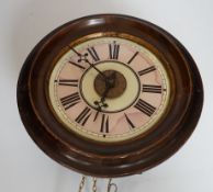 An antique postman's alarm clock with pendulum and weights, 27cm
