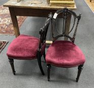 A pair of late Victorian parcel gilt salon chairs