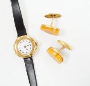 A lady's George V 18ct gold manual wind wrist watch, on later associated leather strap, case