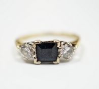 An 18ct gold, single stone sapphire and two stone diamond set ring, size O/P, gross weight 3.3