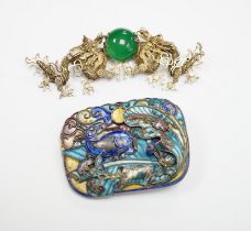 A Chinese? white metal and polychrome enamelled brooch, depicting a hare amongst foliage, 59mm