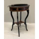 A late 19th century French marquetry inlaid ebonised and kingwood oval jardiniere table, width 56cm,