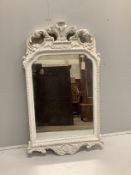 An 18th century style carved painted pine wall mirror, width 75cm, height 133cm