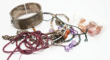 A modern silver hinged bangle and a quantity of mixed jewellery including fittings, bead
