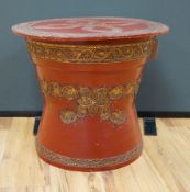A South East Asian composition red lacquered table inset mirrored sequins, 44cm high x 51cm in