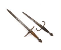 A reproduction stiletto and dagger, stiletto with engraved steel blade, steel pommel and quillon,