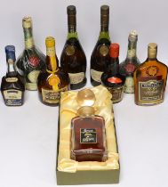 A bottle of Harrods Whisky, 12 years old, two bottles of Janneau VSOP Grand Armagnac, a bottle of