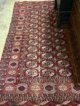 A Bokhara rug and a Belouch runner larger 250cm x 156cm.