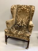 A George III mahogany velvet brocade wingback armchair, for use by Edward VII, width 84cm, depth