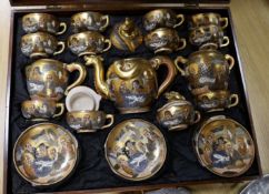 A large mahogany cased set of early 20th century Satsuma teaware