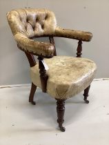 A late Victorian mahogany and buttoned leather tub frame desk chair, width 62cm, depth 50cm,