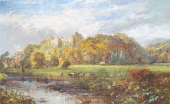 19th century English School, oil on canvas, River scene with cattle, a castle ruin in the