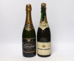 A bottle of Bouvet-Ladubay Champagne and a bottle of Lanson Champagne