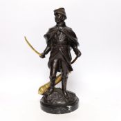A bronze figure of Wellington with brass sword blade and cannon, signed ‘Boucher’, mounted on a