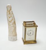 An Eric Gill sculpture of Madonna and child and a carriage timepiece, sculpture 23cm high