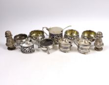 Eleven assorted antique and later silver bun salts, pepperettes and mustard pots including Victorian