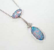A 1920's style 9ct white metal and two stone black opal doublet set drop pendant necklace, overall
