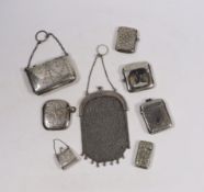 Four assorted early 20th century silver vesta cases and one base metal vesta case, two silver purses