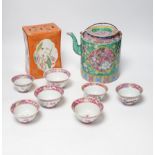 A Chinese Straits enamelled porcelain teapot and cover and seven similar tea bowls, Guangxu period