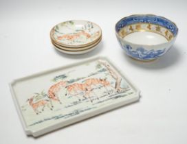 Five items of Chinese tableware; a rectangular tray, three shallow dishes, and a blue and white bowl
