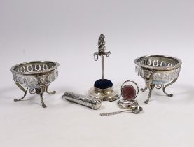 A pair of continental white metal mounted glass cauldron salts, with one associated spoon, an