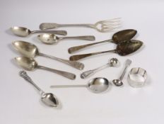 Eleven assorted items of mainly 19th century silver flatware and a silver napkin ring, 18oz.