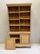 A Victorian and later pine bookcase / cupboard, width 102cm, depth 33cm, height 195cm.